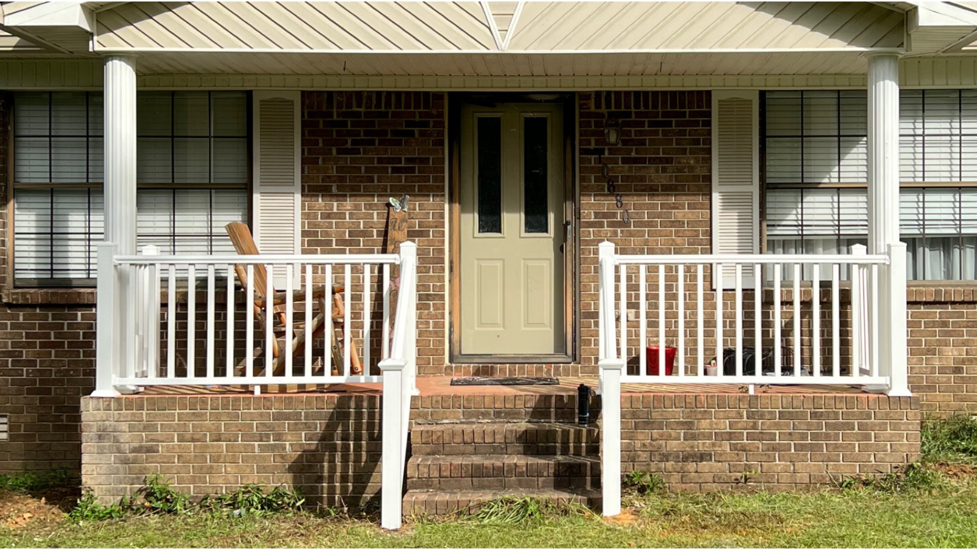 Front porch rebuild with new railing