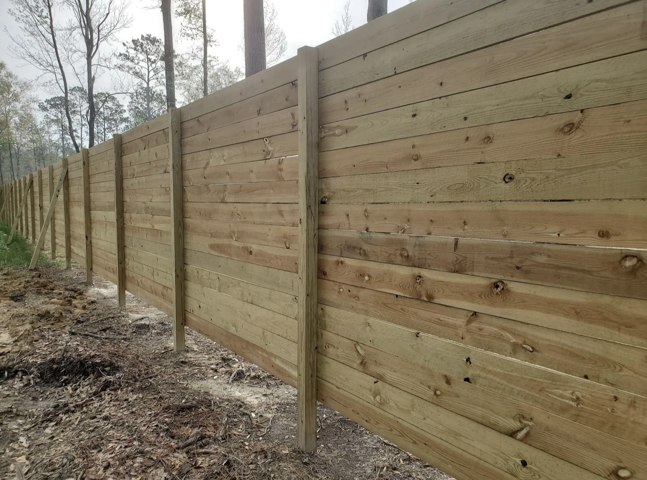 Steel-framed double drive gate aligned and rehung