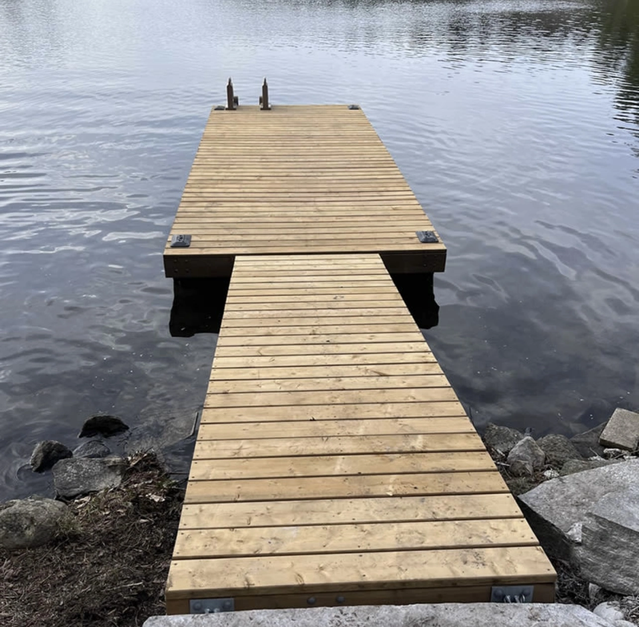 Straight residential wood dock with secure galvanized hardware and true alignment