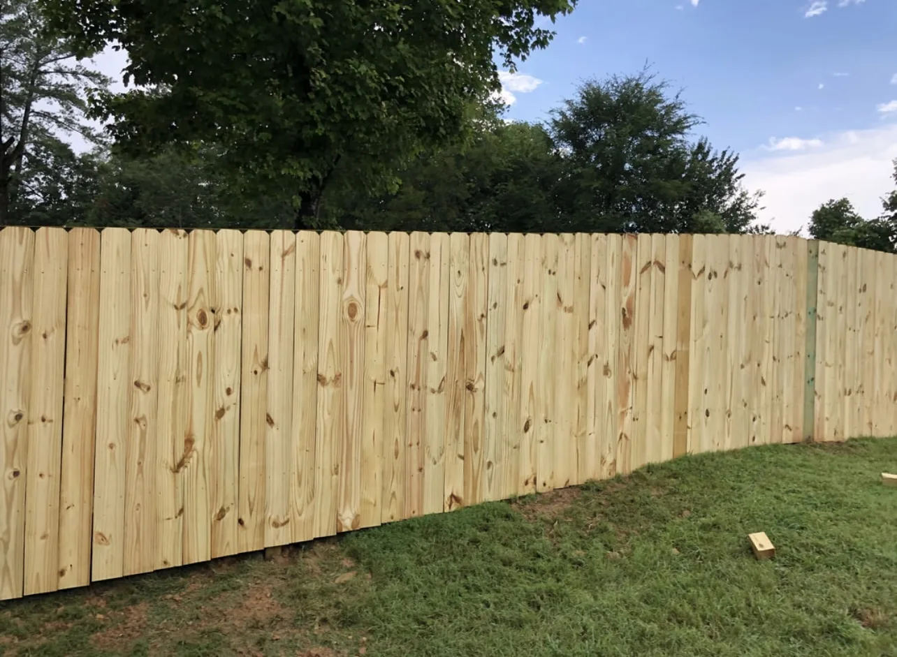 Privacy fence stepped with grade