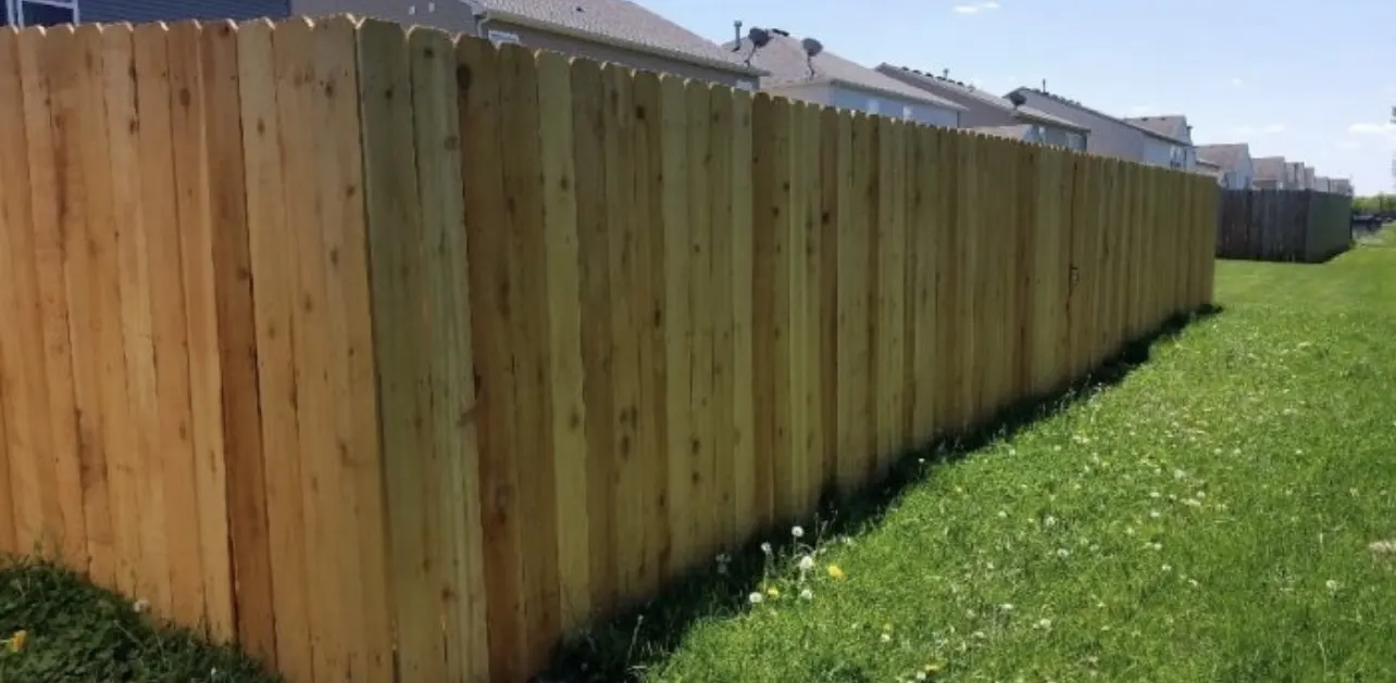 Backyard privacy fence with even posts